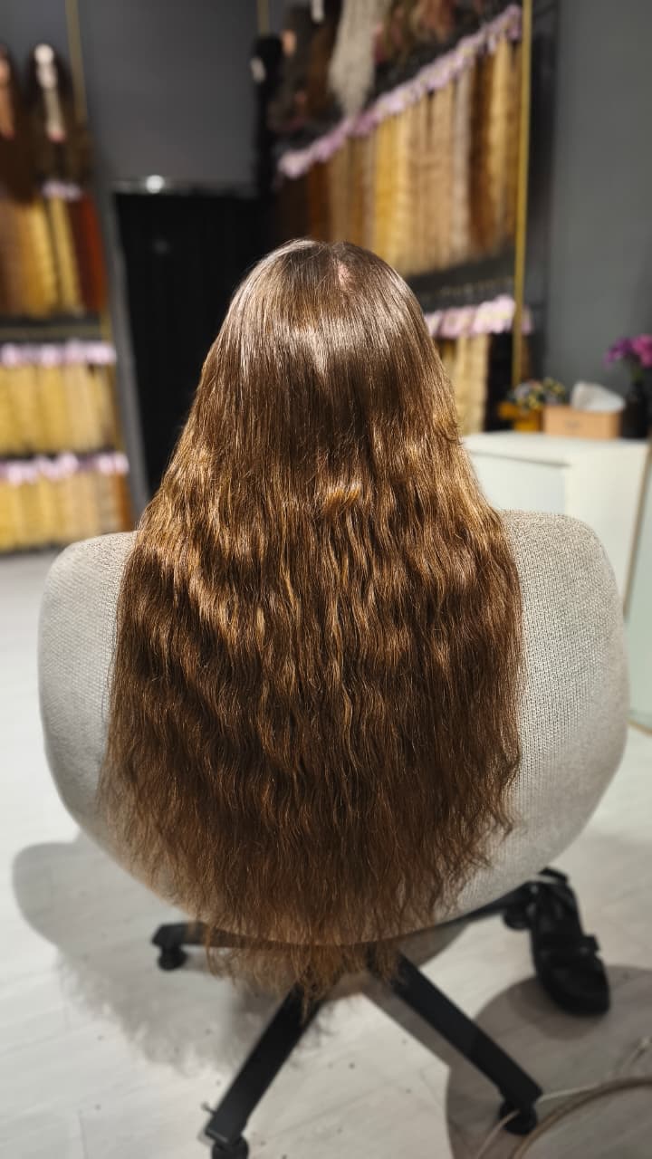 Same client after — long wavy brown, Keratin Bond 150 g double drawn