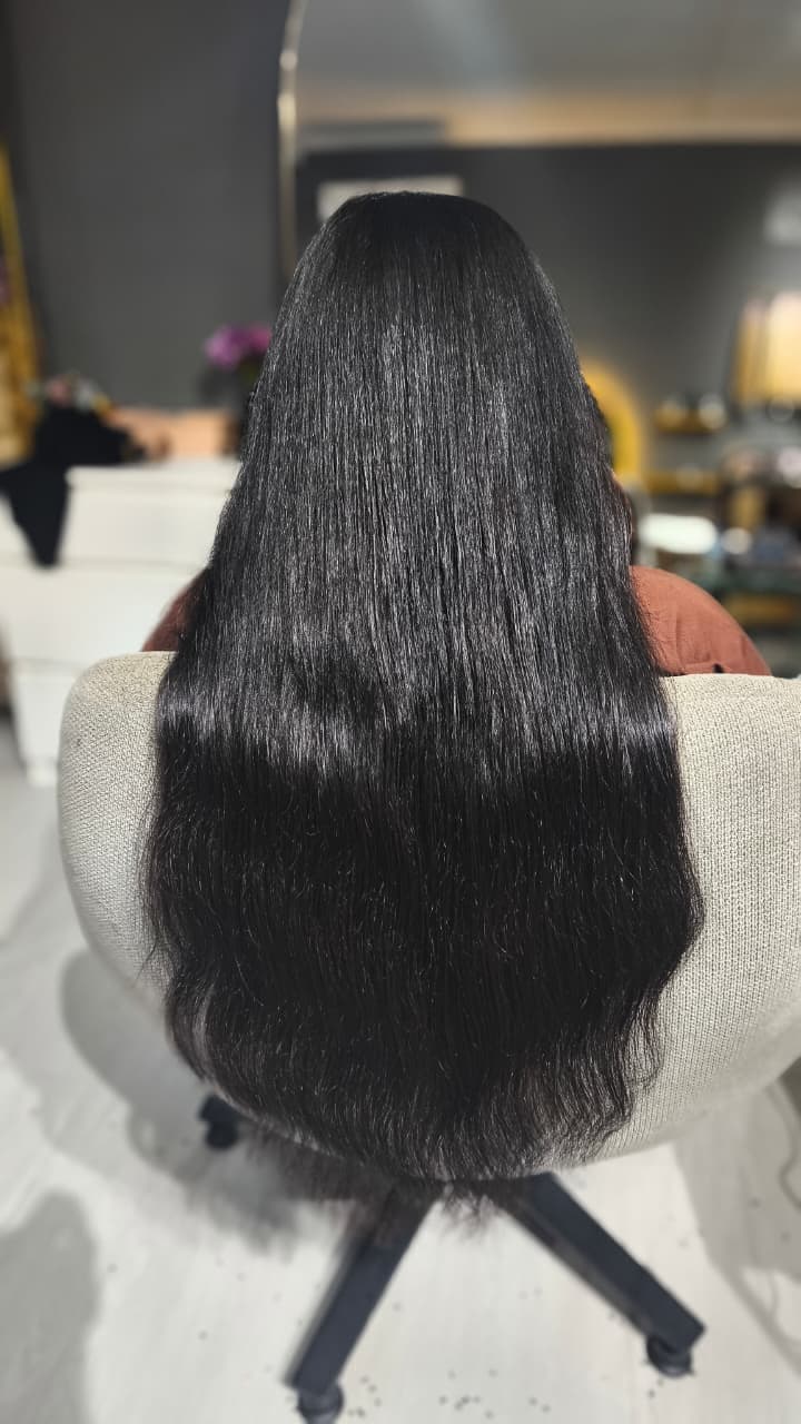 Same client after — full black length, Keratin Bond double 150 g
