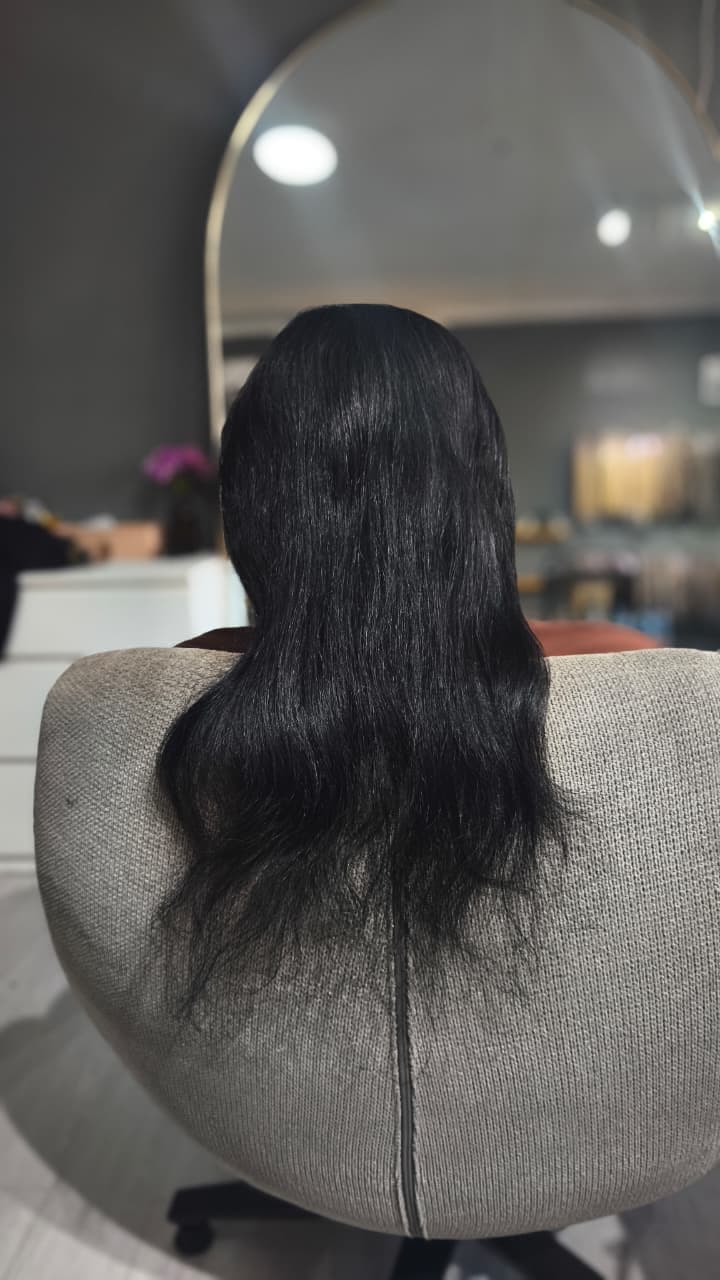 Client before — thin black hair to mid-back