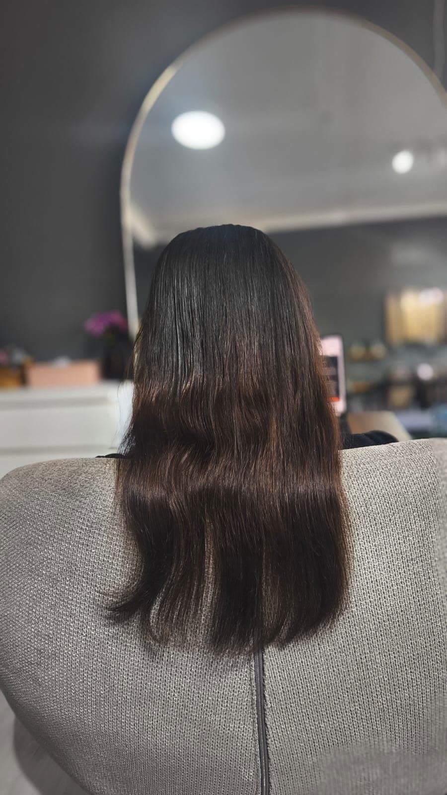 Client before — dark hair cut to the shoulders