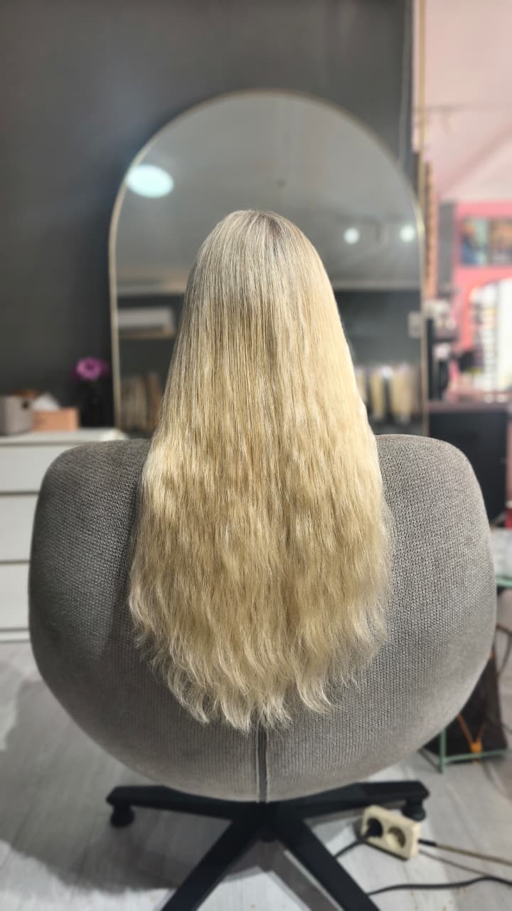 Same client after — long blonde length, Keratin Bond double 100 g