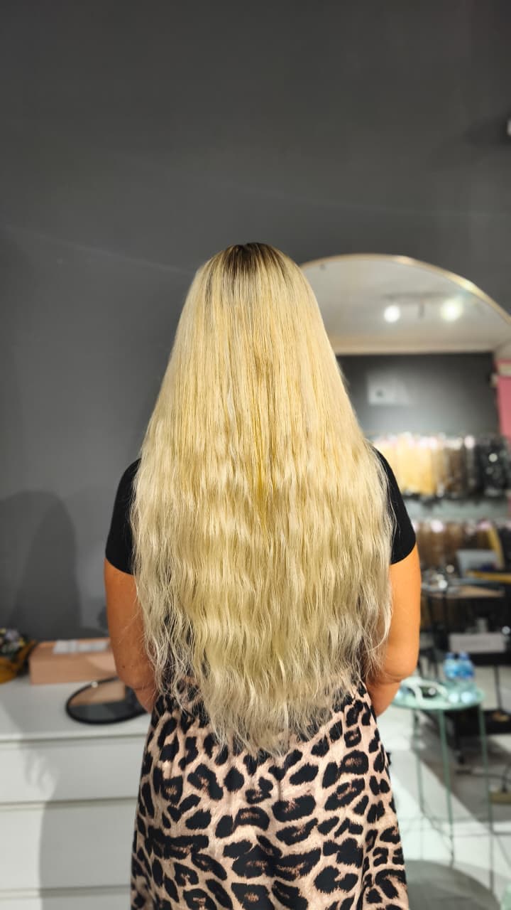 Same client after — long blonde waves past the waist, Keratin Bond double 200 g