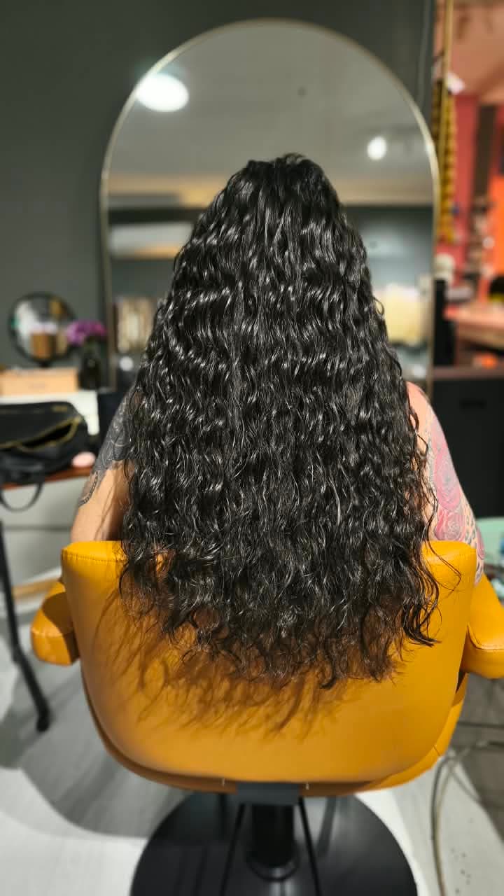 Same client after — long dark curls past the waist, Keratin Bond double 200 g