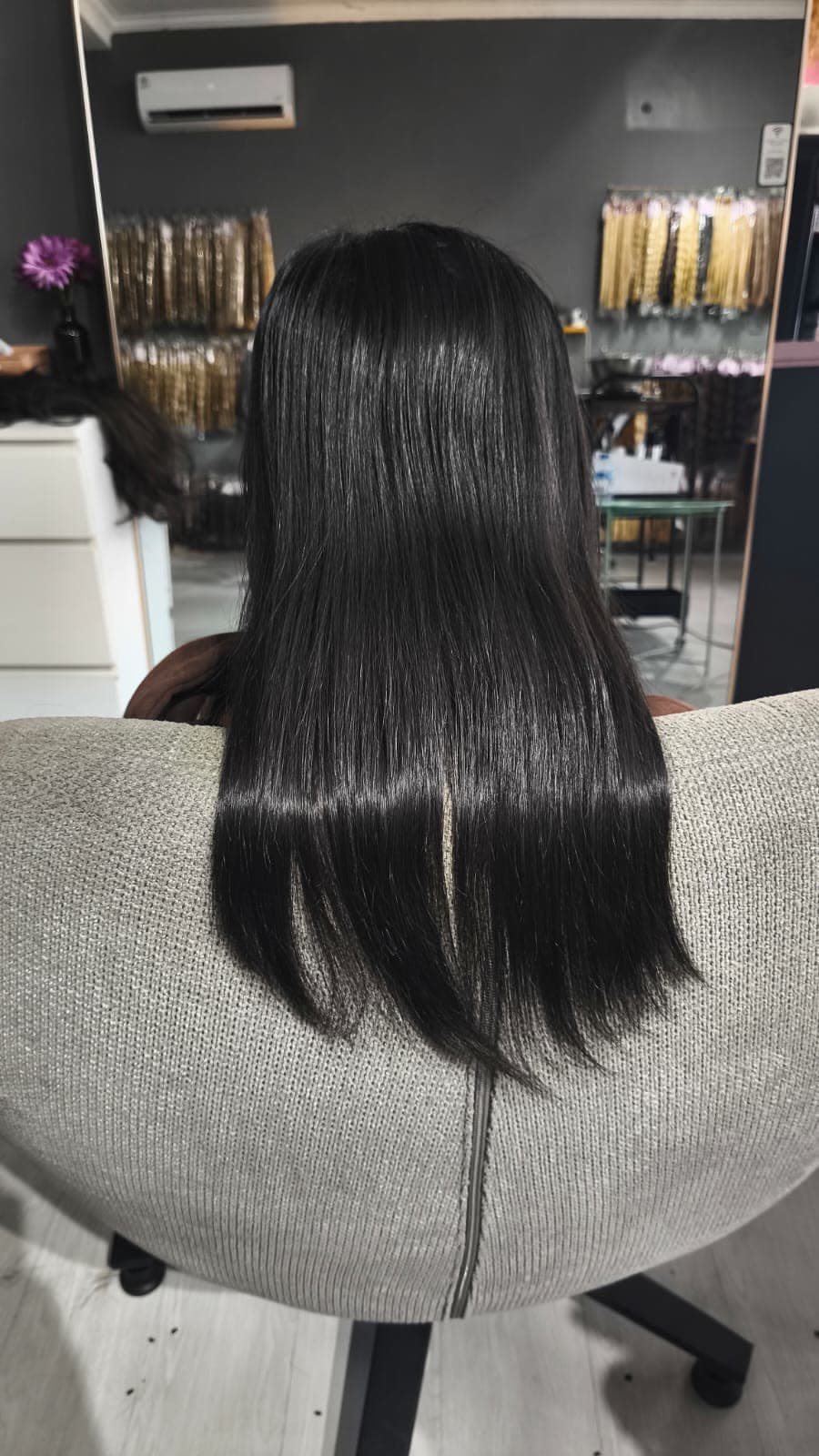 Client before — straight black hair to the shoulders