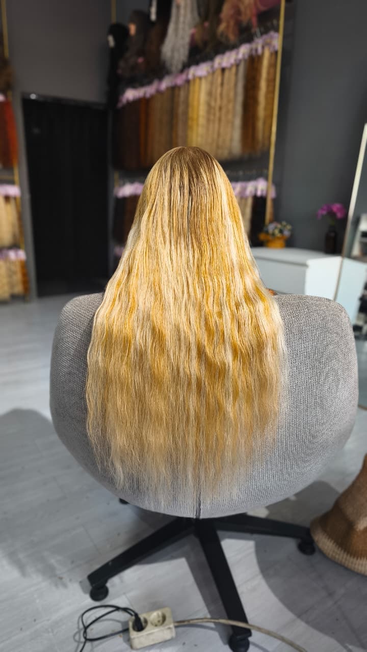 Same client after — long golden blonde, Keratin Bond 100 g double drawn