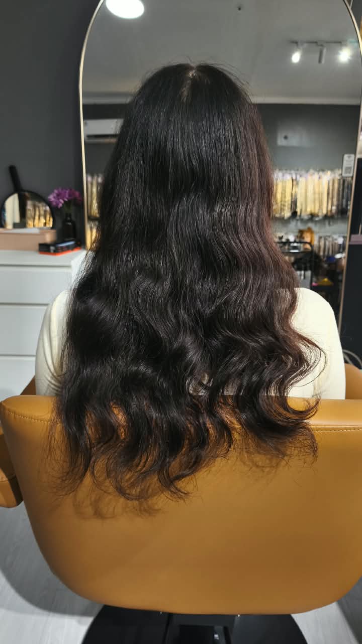 Client before — dark brown waves to mid-back