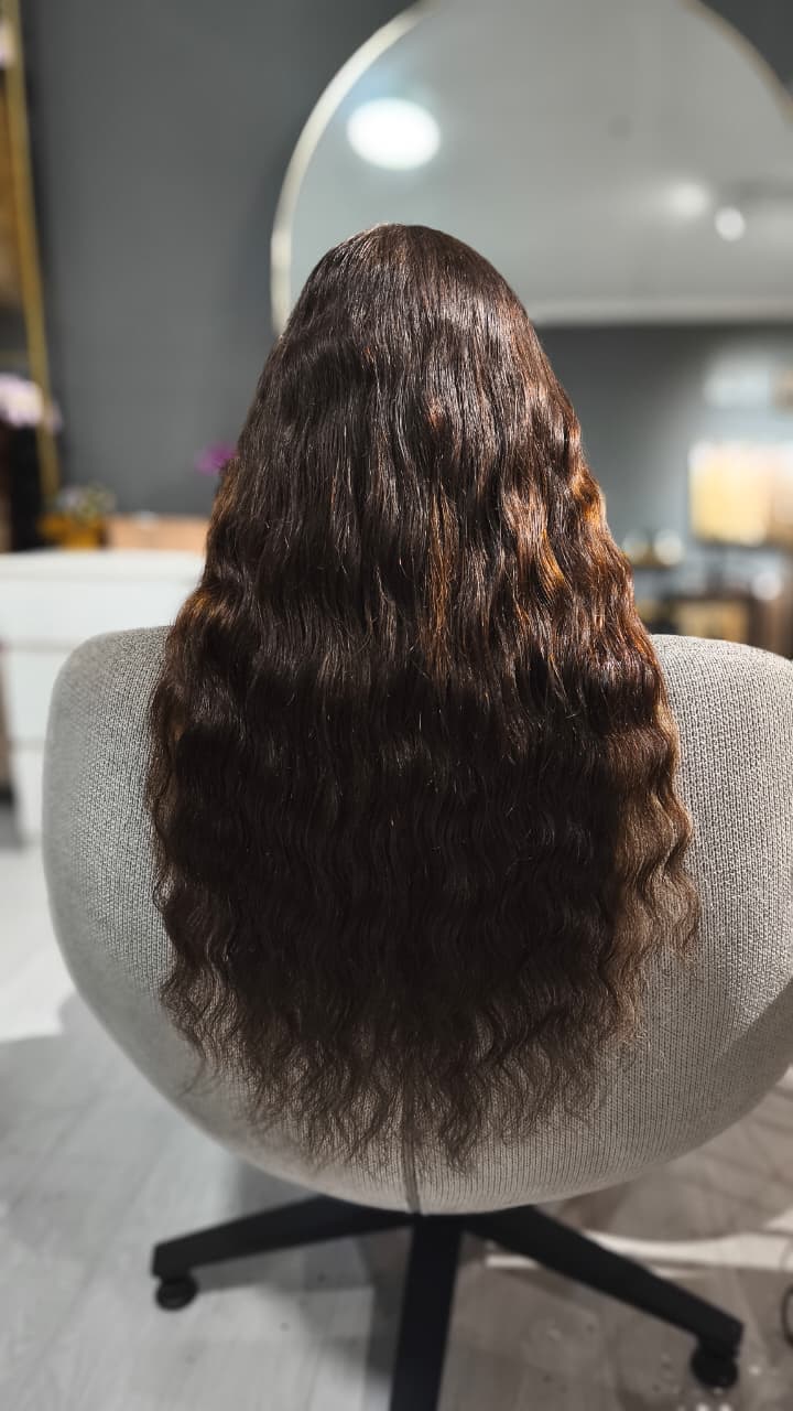 Same client after — long dark brown waves, Keratin Bond 150 g double drawn