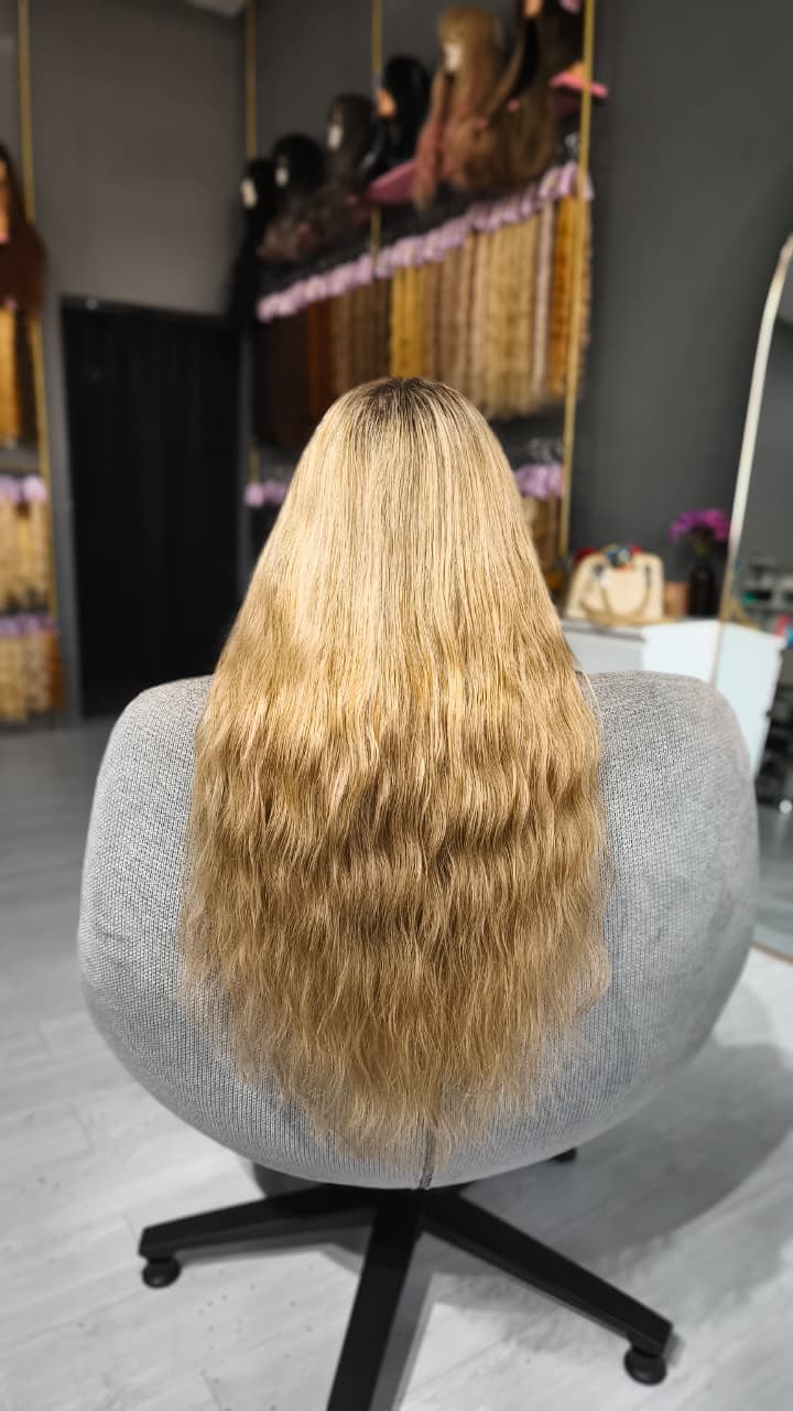 Same client after — full blonde waves, Keratin Bond 200 g single drawn