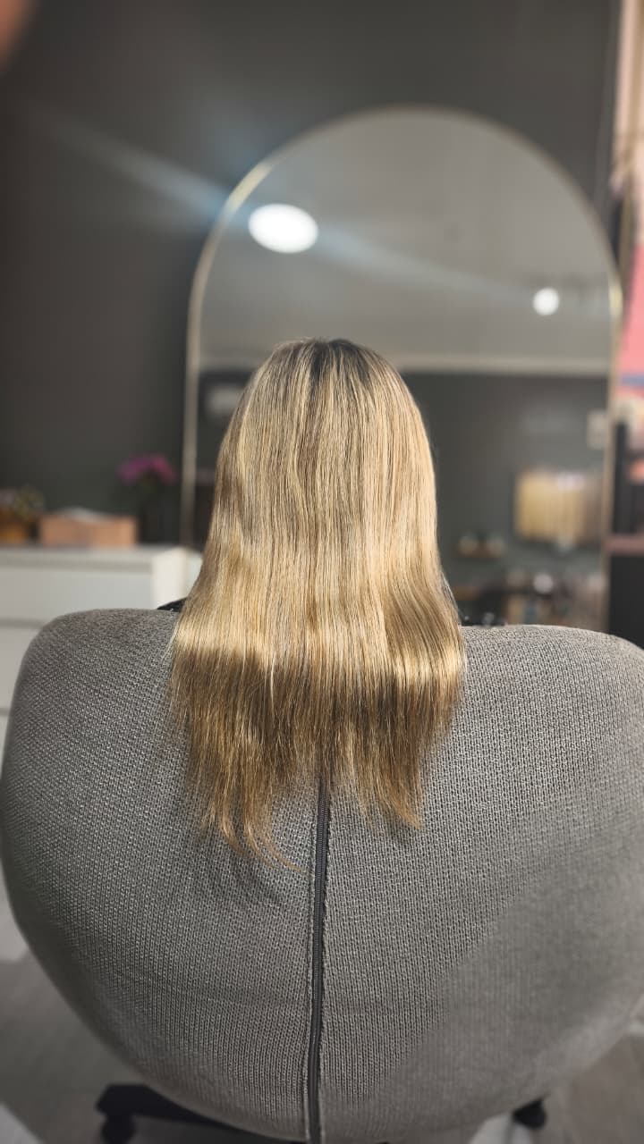Client before — blonde hair with fine, tapering ends