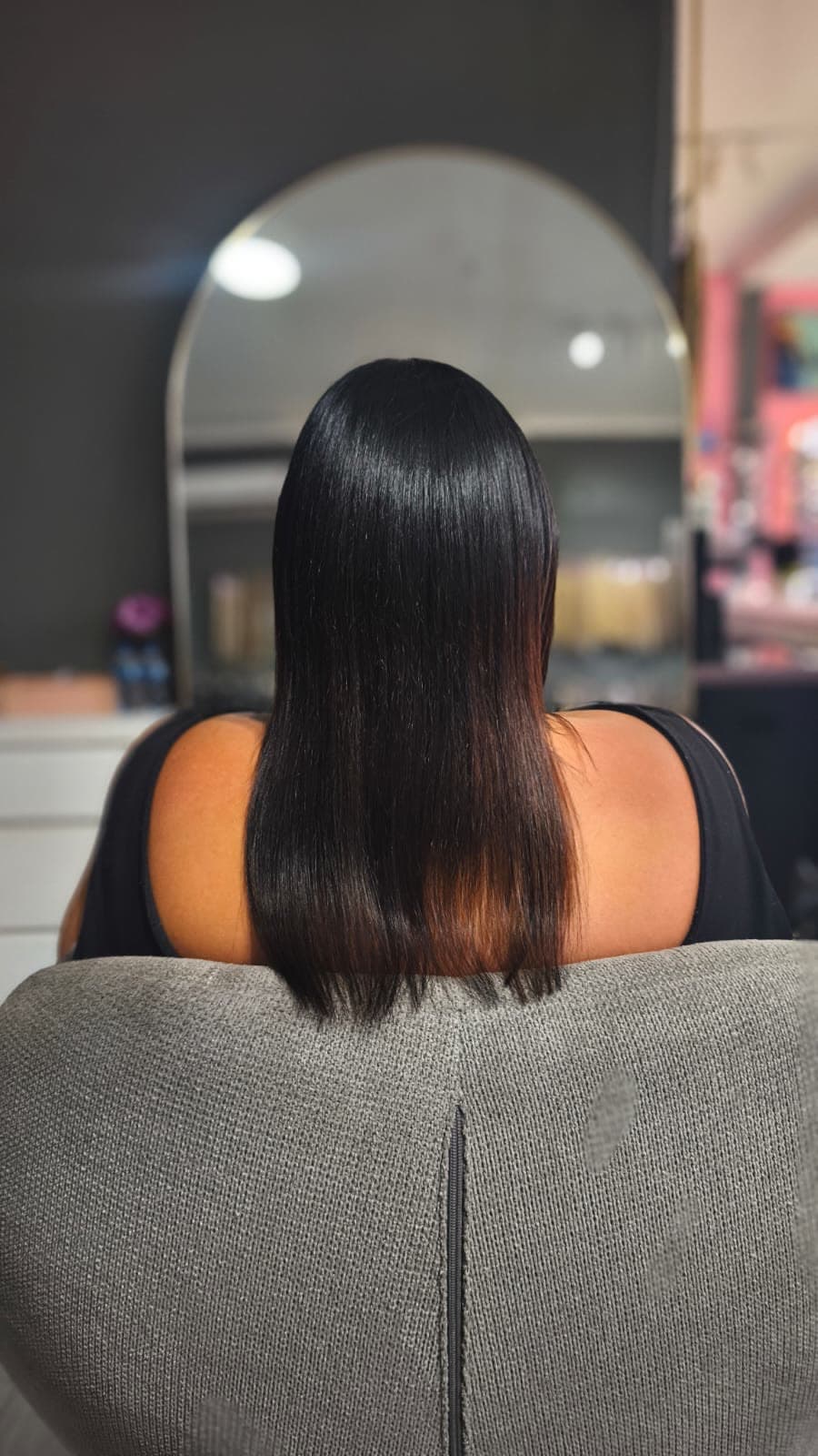 Client before — dark hair cut to the shoulders
