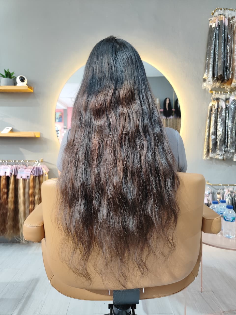 Same client after — fuller brown waves past the waist, Nano Ring single 150 g