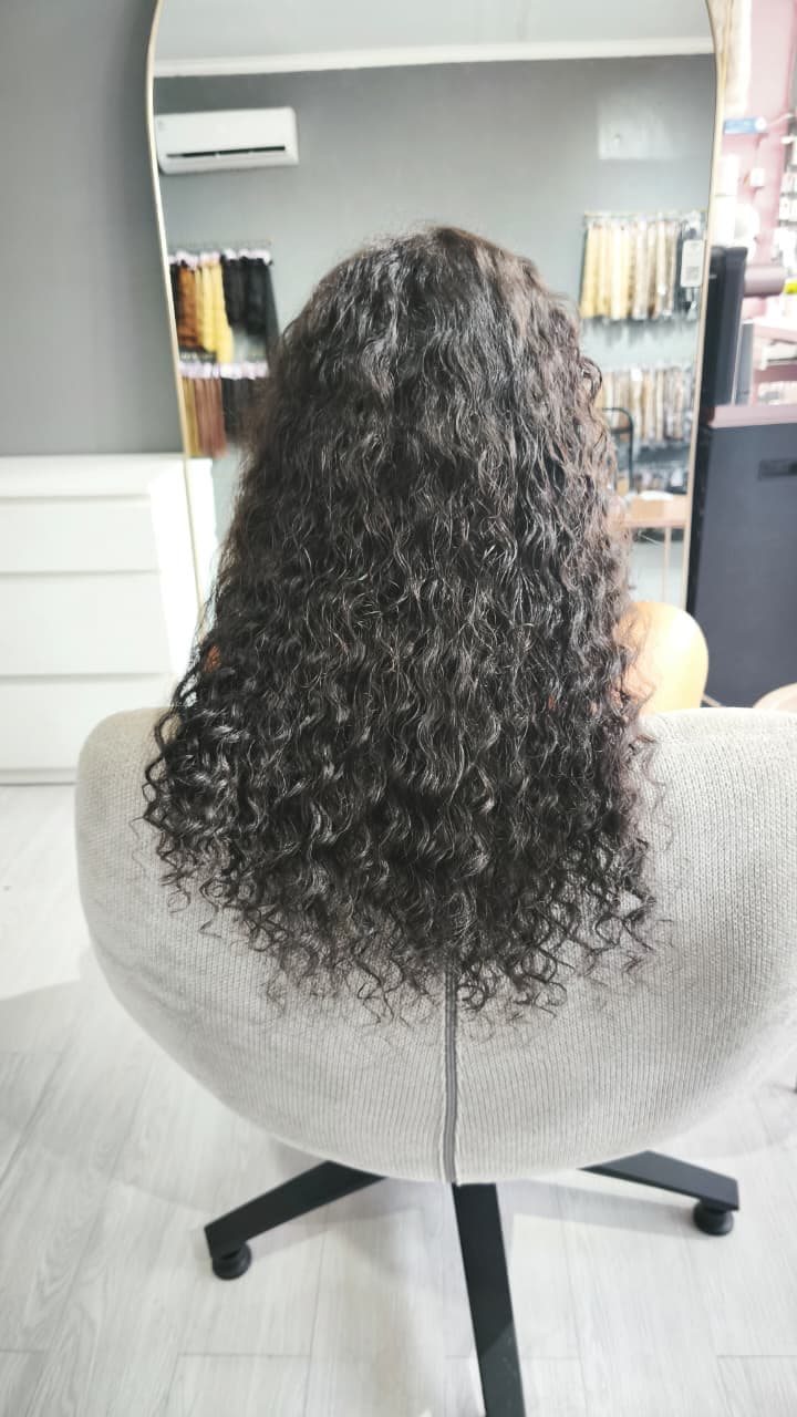 Same client after — long dark curls, Nano Ring curly 100 g