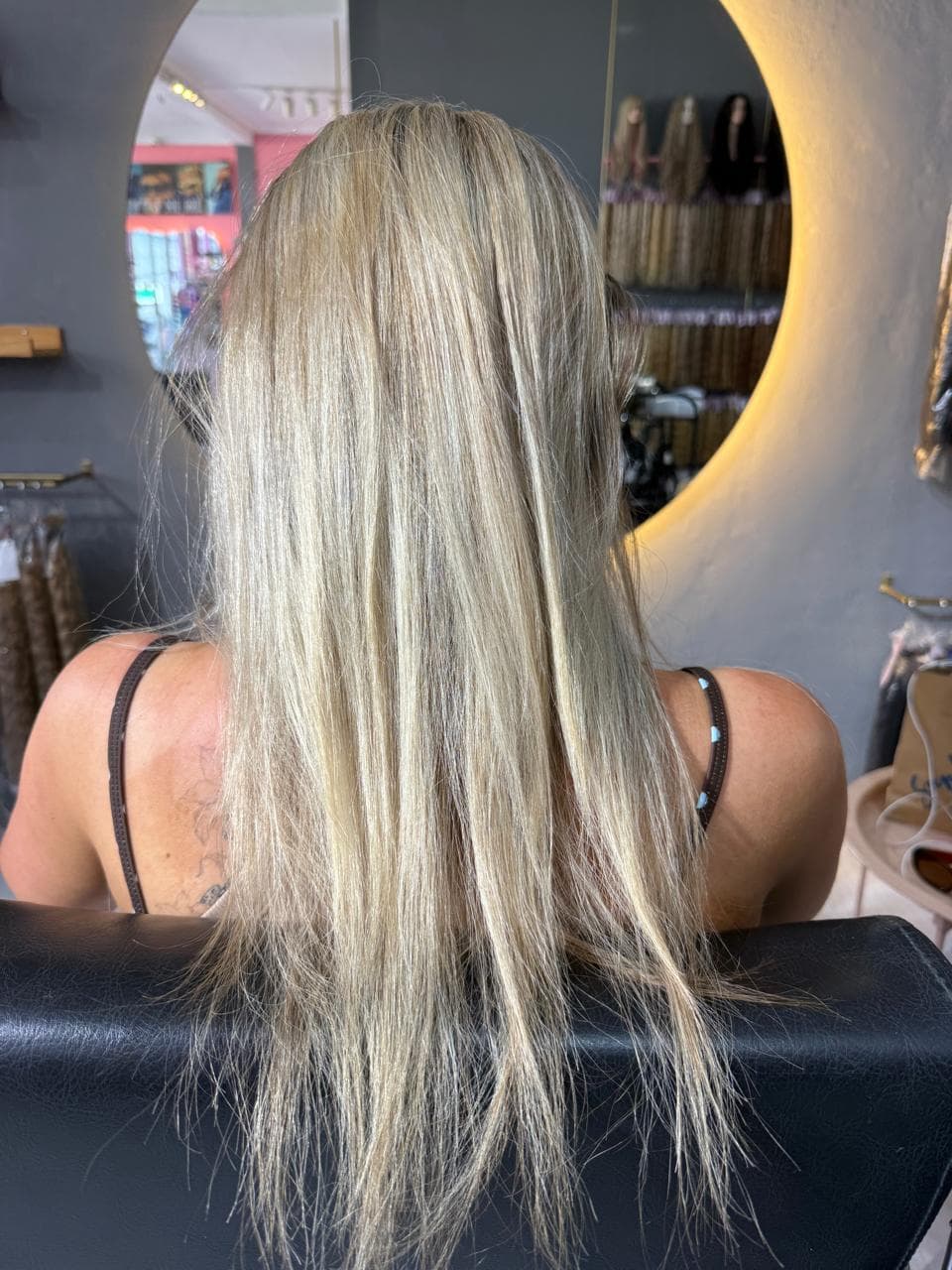 Client before — blonde hair to mid-back, fine through the ends