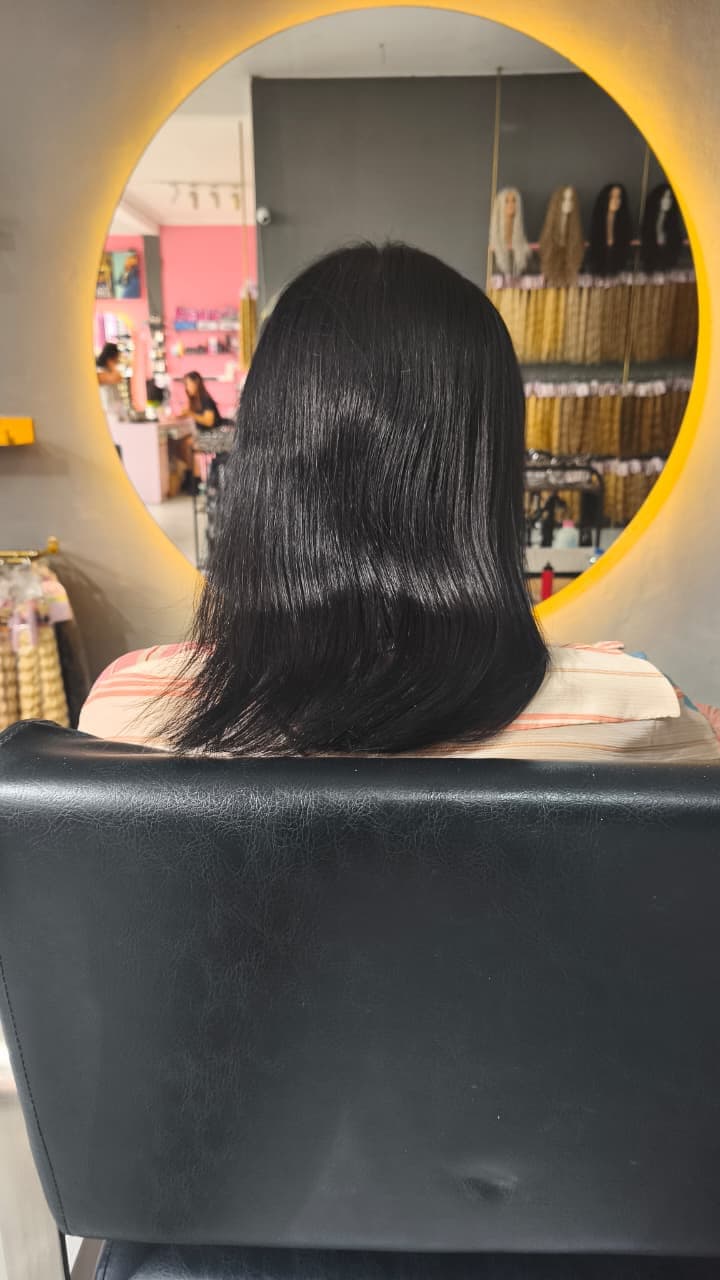 Client before — black hair cut to the shoulders