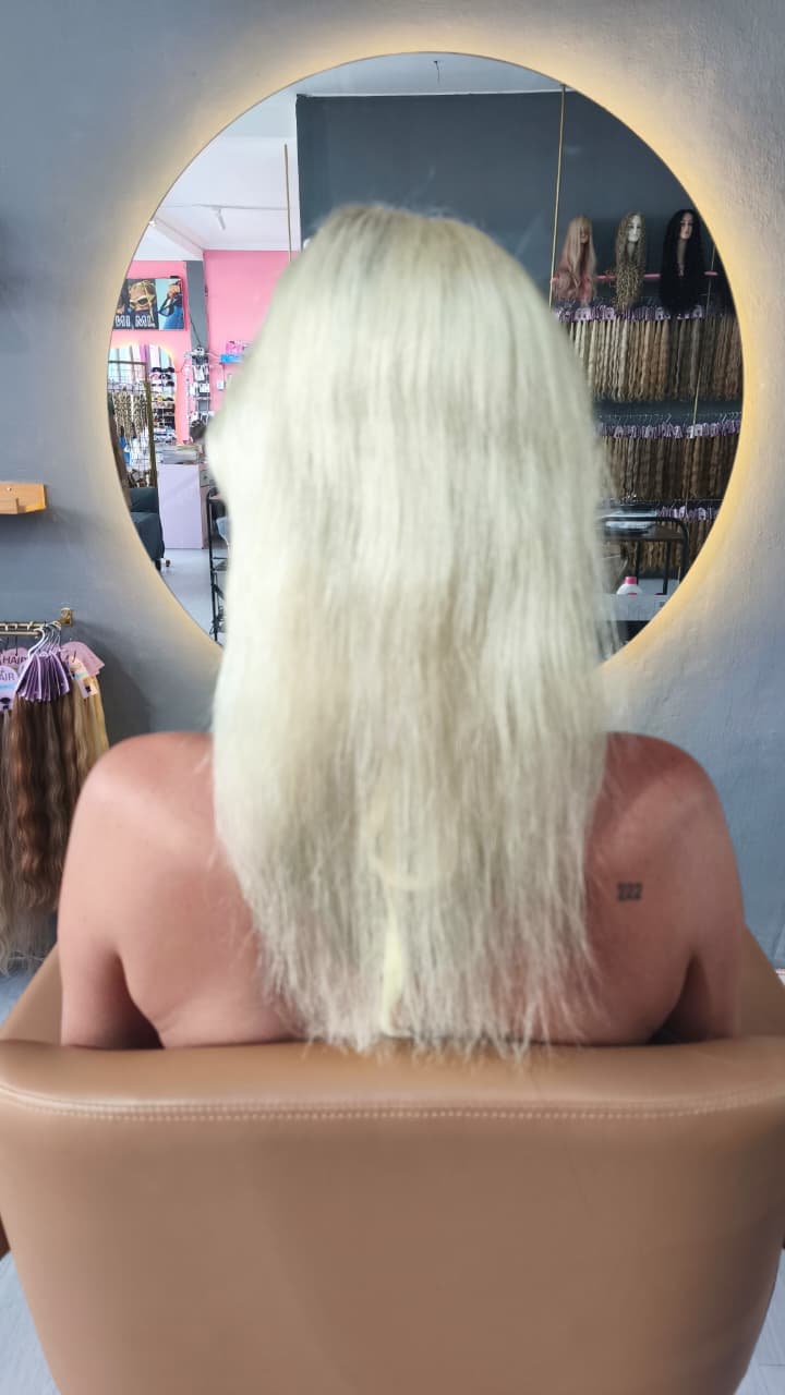 Client before — platinum blonde past the shoulders, thin and wispy at the ends