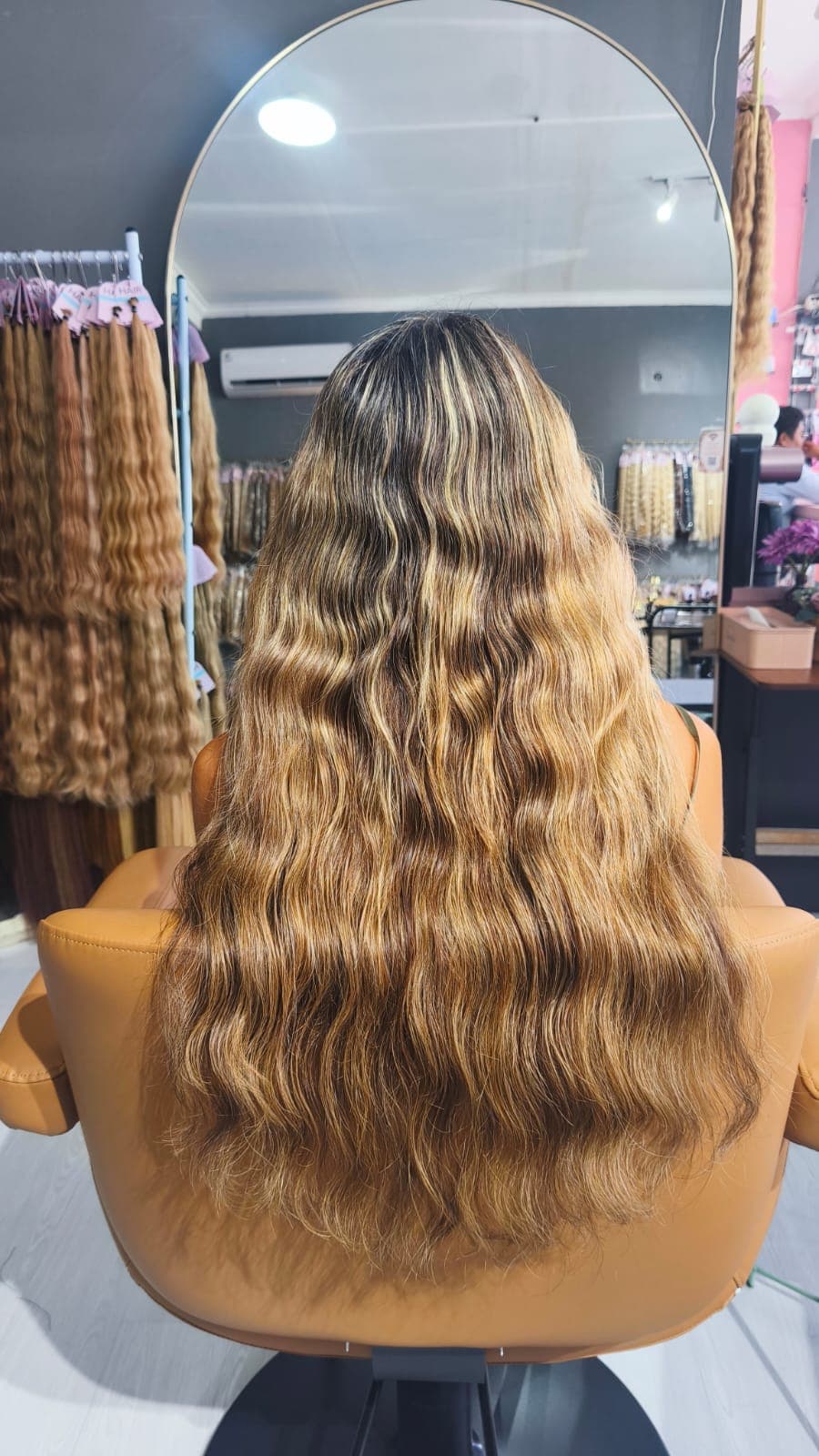 Same client after — longer, fuller golden waves, Weft double 100 g