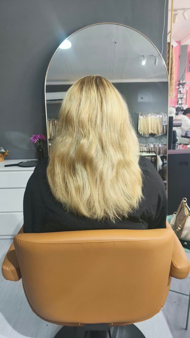 Client before — blonde hair to the shoulders, fine through the ends